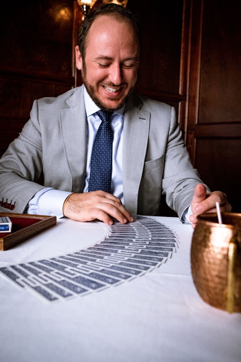 Professional magician performing at a Houston event